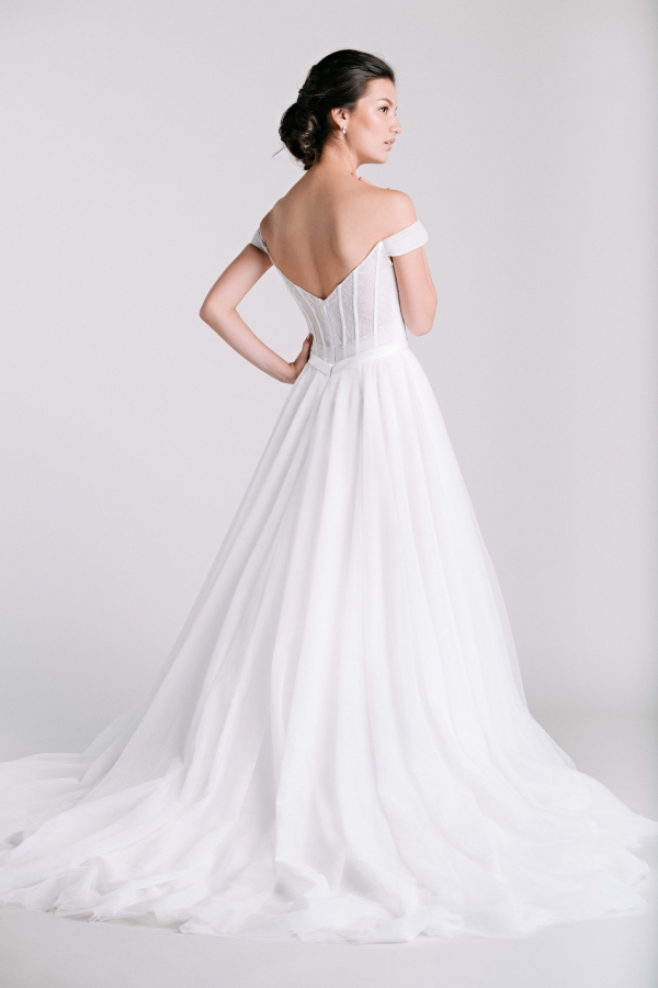 sheer lace back off shoulder a-line from Ivory & White Bridal Store