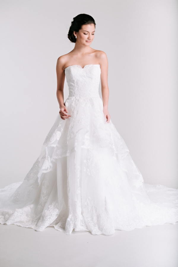 tiered lace ballgown wedding dress from Ivory & White Bridal Store