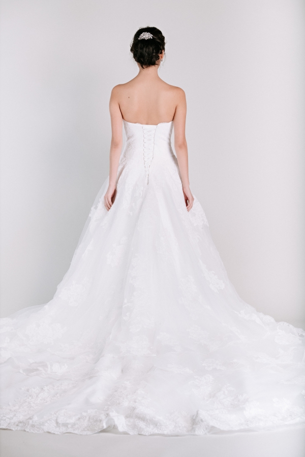 long train tiered lace ballgown wedding dress from Ivory & White Bridal Store