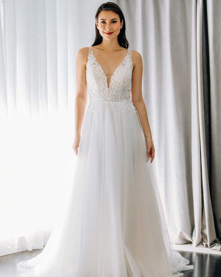 Ivory & White Bridal v-neck lace and tulle a-line wedding dress